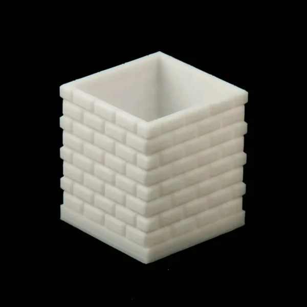 A square 3D printed cactus and succulent pot with a brick pattern design, perfect for modern plant displays.