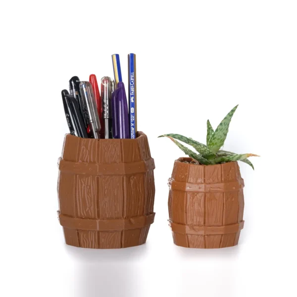 A barrel-shaped aged keg pot, perfect for succulents and pens. A stylish and functional addition to your home or office decor.