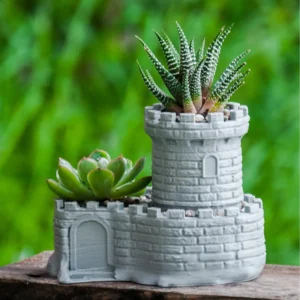 A medieval-themed castle succulent planter and pen holder, perfect for adding a unique and functional touch to your home or office decor.