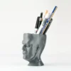 A Frankenstein-themed planter and pen holder, perfect for adding a unique and functional touch to your Halloween decor.