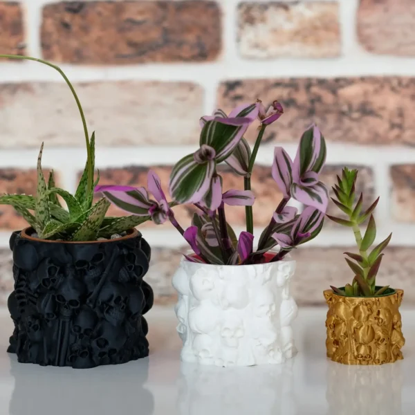 A gothic planter with human bones and a skull, perfect for plants and pens. A stylish and functional addition to your home or office decor.