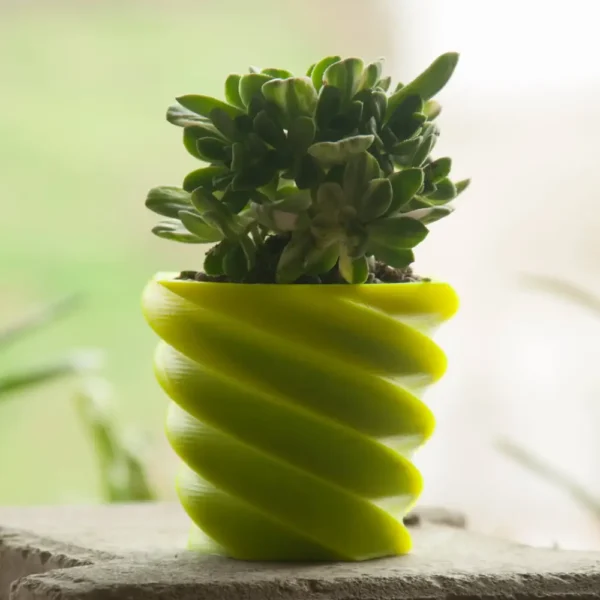 A spiral design succulent cactus planter that doubles as a pen holder and desk organizer, perfect for modern home and office decor.