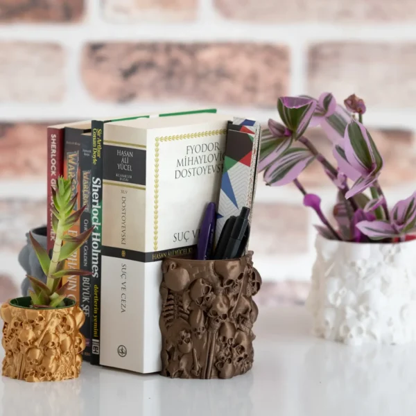 A gothic bookend with human bones and a skull, perfect for organizing books, pens, and bookmarks. A stylish and functional addition to your bookshelf.