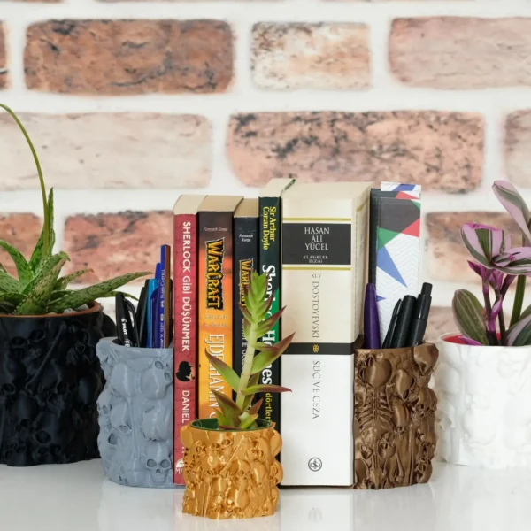 A gothic bookend with human bones and a skull, perfect for organizing books, pens, and bookmarks. A stylish and functional addition to your bookshelf.