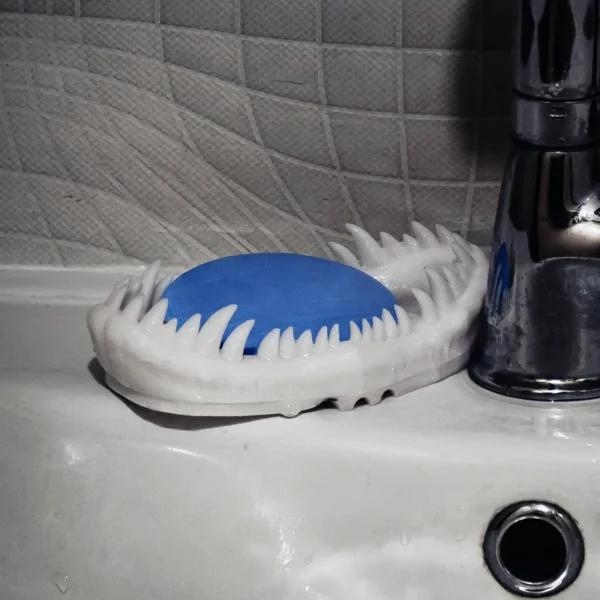 A T-Rex skull soap dish, perfect for adding a unique and functional touch to your kids' bathroom decor.