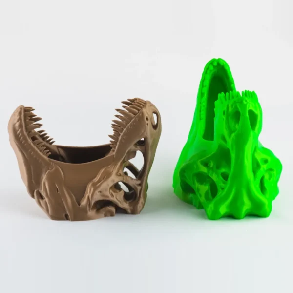 A T-Rex skull succulent planter and pen holder, perfect for adding a unique and functional touch to your home or office decor.