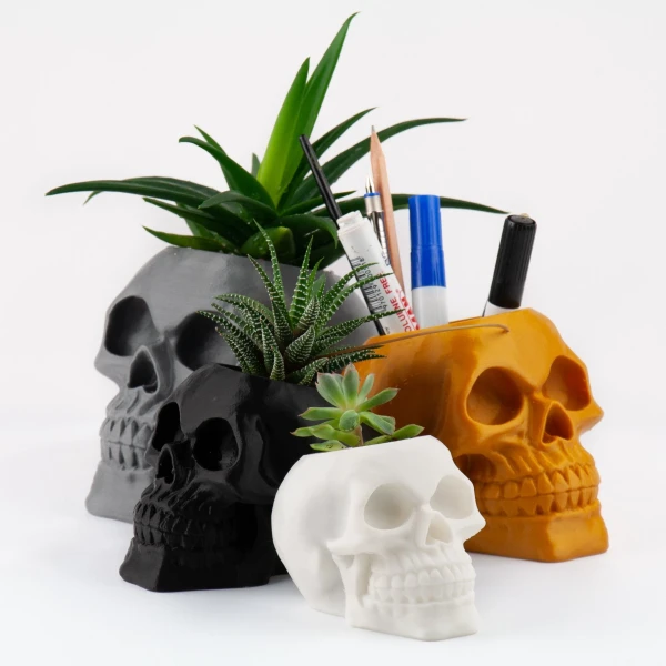 3d printed skull planter and pen holder with various sizes